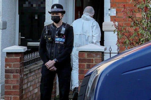 Police at the scene where a body was found in March this year. Photo: SWNS.