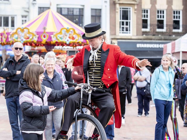 Hundreds enjoyed music, circus acts, and memories from the decade during a sixties celebration event in Northampton's Market Square on Saturday (September 24).