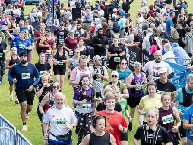 Hundreds of runners braved showers and wind to take on the race on Sunday (May 25), which started and finished at Sixfields stadium.