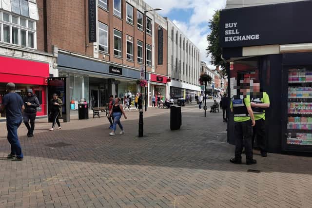 The litter wardens in the town centre