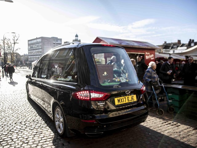 Hundreds gathered in the Market Square on Wednesday morning (December 7) to pay their respects to town legend Eamonn 'Fitzy' Fitzpatrick