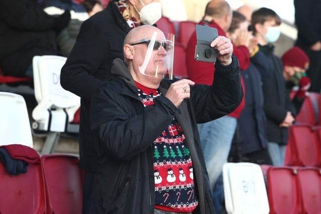 Northampton Town fans return to watch their team during the Sky Bet League One match between Northampton Town and Lincoln City at PTS Academy Stadium on December 19, 2020.
