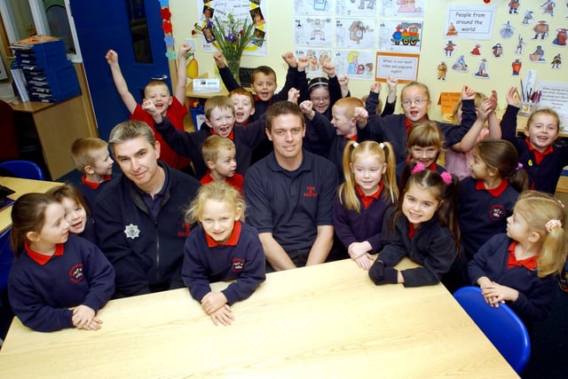 Firefighters visit the school in 2004 and it looks like the children had great fun.