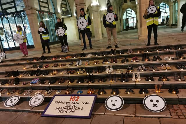 The group claims 102 people die every year from toxic air in the town