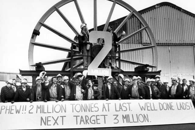 Jubilant miners celebrating reaching two million tonnes in 1989