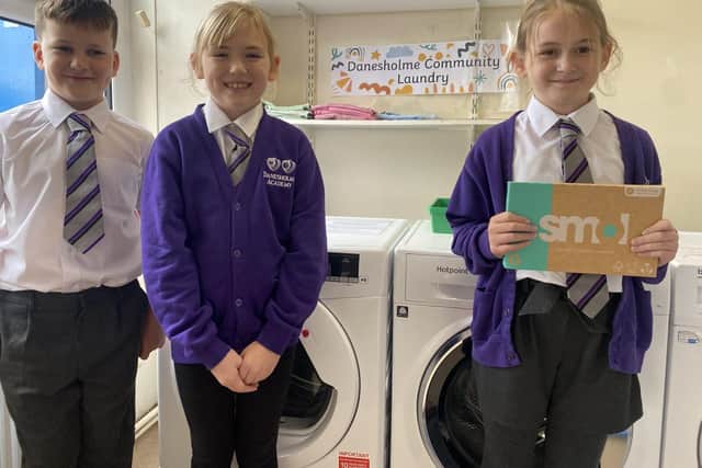 Pupils celebrating the launch of Danesholme Community Laundry