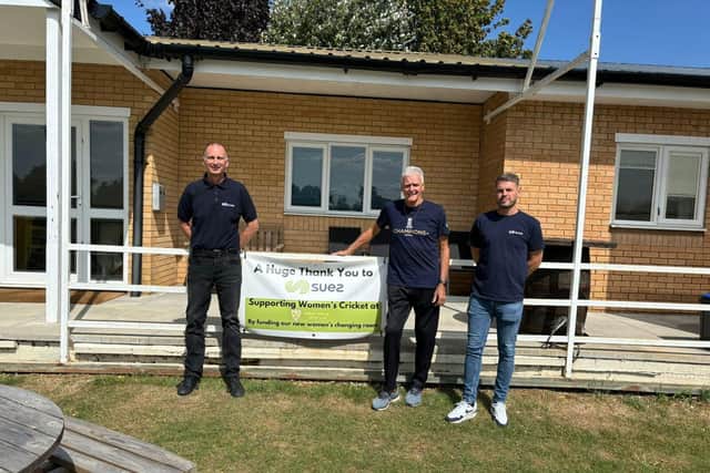 Great Oakley Cricket Club with proud sponsors SUEZ, outside new changing room facilities