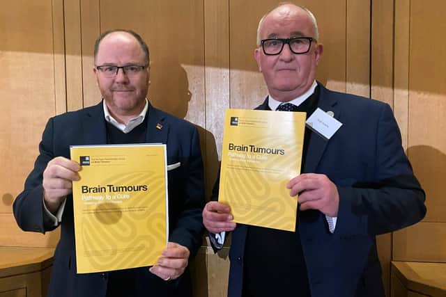 MP George Freeman, minister of state for science, innovation and technology, with Hugh Adam, head of stakeholder relations for Brain Tumour Research.
