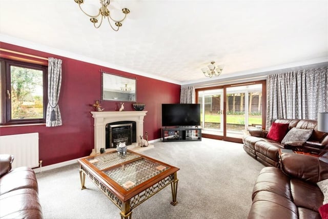 A spacious living room is the perfect spot for entertainment or relaxing as a family