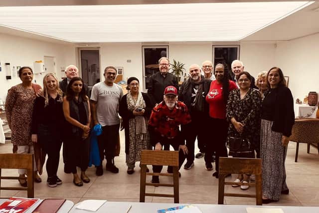 Omid Djalili and Cheryl Armatrading (centre right) with members of the Northampton InterFaith Forum