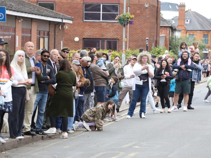 Kettering town centre: crowds line town centre to welcome The Royal Anglian Regiment for Armed Forces Day parade /National World