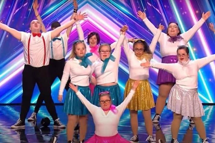 A show-stopping performance from 14 members of Northampton dance group, Born To Perform, persuaded Britain's Got Talent judge, David Walliams, to push his golden buzzer and send them straight to the semi-final.