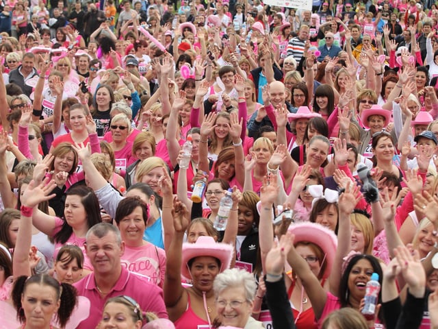 2011 - Over four thousand women warm up before the start in the 5k Race for Life at Abington Park in Northampton.