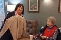 Julie helping residents at out pop up shop event