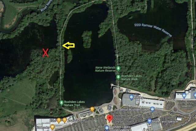 The yellow arrow is where the rescuers accessed the water, swimming to the 'cove' shown by the red cross