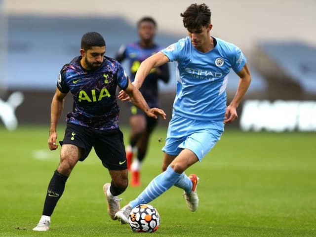 Finley Burns of Manchester City in action against Tottenham Hotspur during a Premier League 2 match in 2021. (Photo by Ashley Allen/Getty Images)