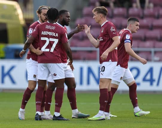 Tyreece Simpson opened his Cobblers account with a well-taken penalty.