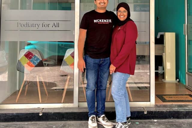 Usama and Zahra outside their Podiatry For All clinic
