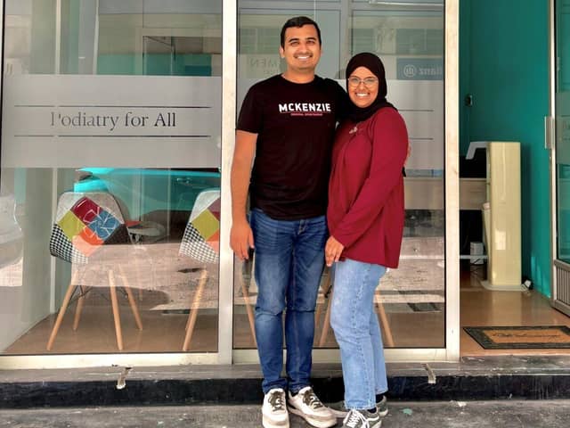 Usama and Zahra outside their Podiatry For All clinic