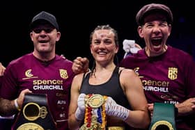 Chantelle Cameron with Jamie Moore (left) and Nigel Travis after beating Katie Taylor in May