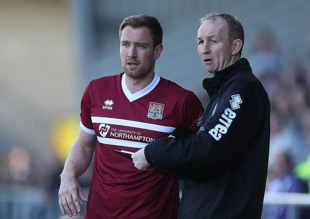 Kelvin Langmead with former Cobblers assistant Alan Knill in 2014.