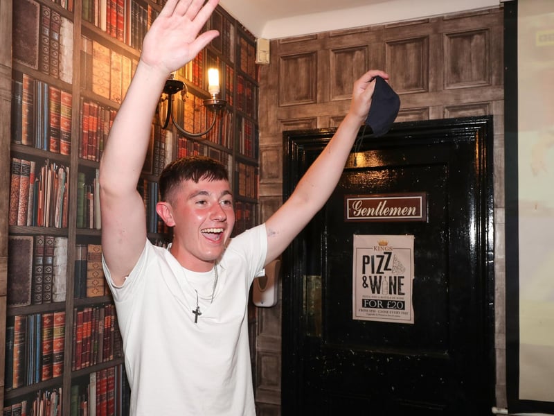 David Harrison runs out of the loo at the Kings pub to celebrate after missing the goal.
(220421-7042)