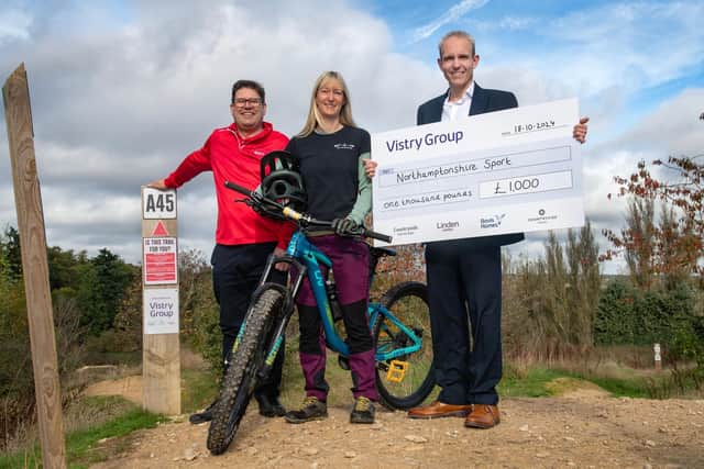 From left, Martin Barnwell from Northamptonshire Sport, Anneka Jones, social value co-ordinator from Vistry South East Midlands and Paul Bennison, marketing manager for Vistry South Central Midlands, at Northampton Bike Park’s Red Trail, which has been sponsored by Vistry