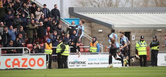 Fraser Horsfall celebrates his goal against Tranmere last month. Pictures: Pete Norton.