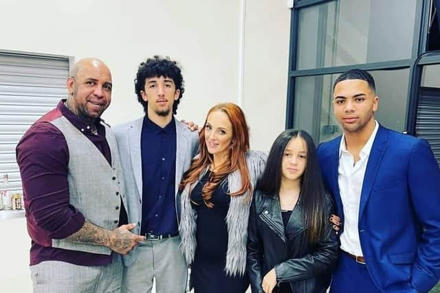Melissa Wolfenden (third from left) and her family will run the business.