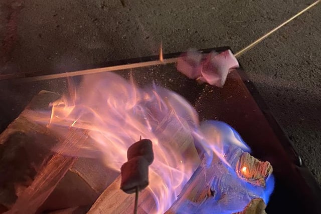 Warm up and roast marshmallows on the fire pits outside the mansion. You can purchase marshmallows from the food stall nearby.