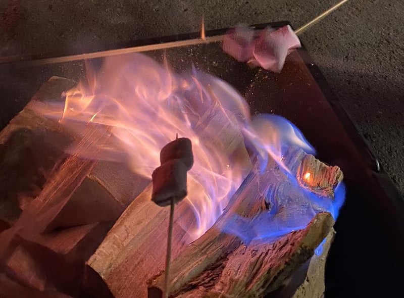 Warm up and roast marshmallows on the fire pits outside the mansion. You can purchase marshmallows from the food stall nearby.