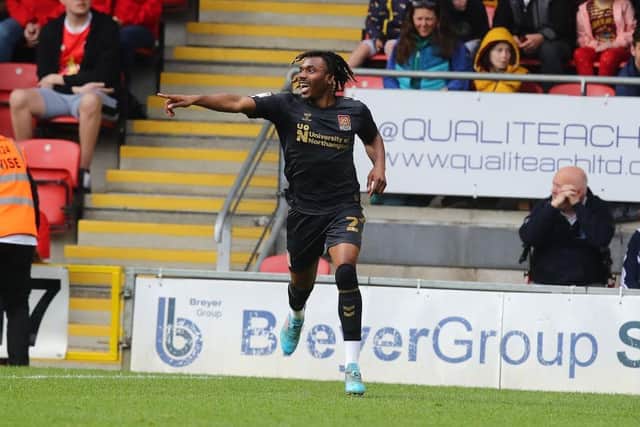 Josh Eppiah celebrates after scoring his first and his side's third goal during the Sky Bet League Two match between Leyton Orient and Northampton Town at The Breyer Group Stadium on April 23, 2022 in London, England. (Photo by Pete Norton/Getty Images)