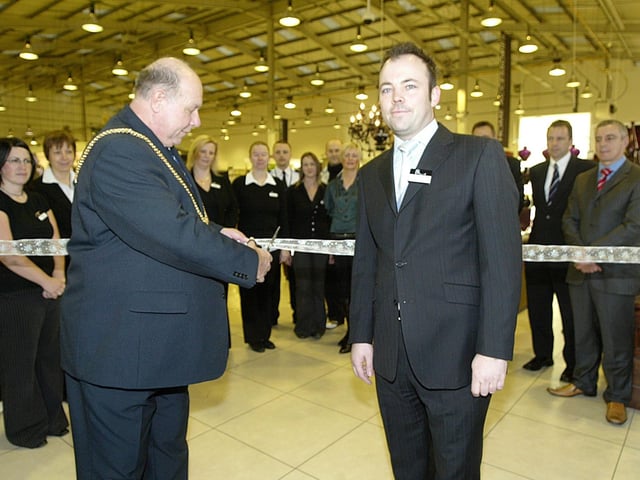 Northampton Mayor Colin Lill with Paul Batchelor, store manager, cutting the ribbon to officially open BHS Home store.