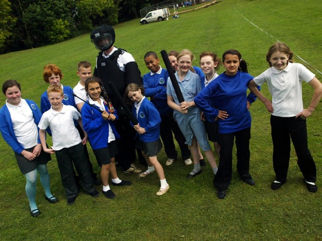 Briar Hill primary students / pupils meet Northants police officers and take part in various activities including learning how to take down a suspect using soft sticks