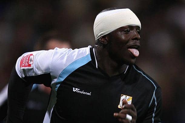 Adebayo Akinfenwa scored both goals the last time Northampton beat Bolton.