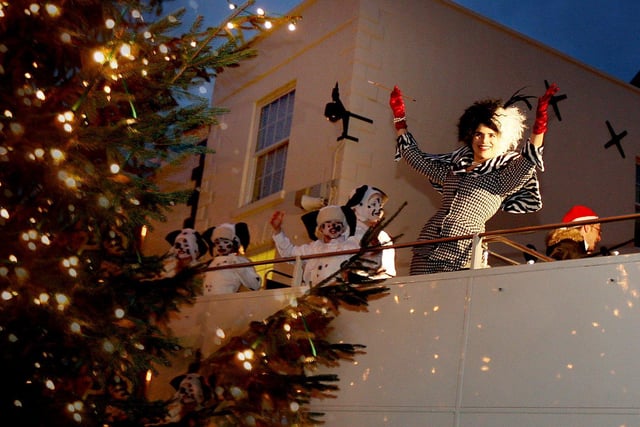 Northampton Town Centre Christmas Lights Switch On - Georgina Roberts as Cruella De Vil from the Royal Theatre production of 101 Dalmations pictured with the christmas lights on Abington street.