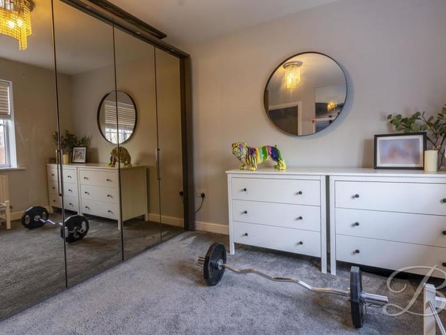 Here are those mirrored wardrobes we were talking about - in a photo that underlines how large the second bedroom is.