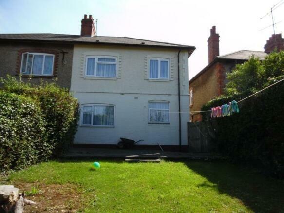 There is a lawned garden to the rear and forecourt to the front.