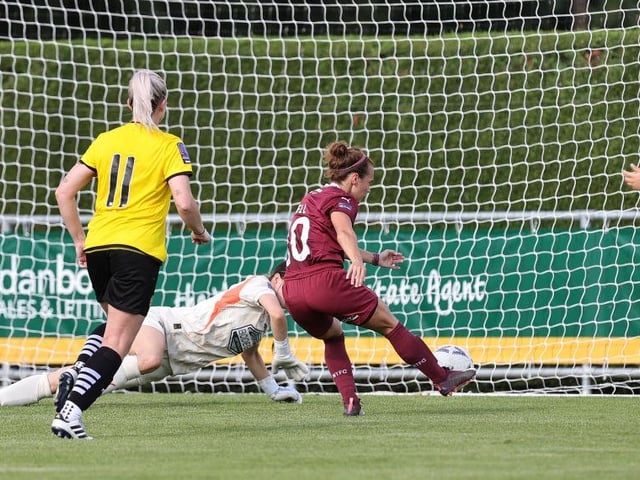 Jade Bell tucks away Northampton's seventh goal to complete her hat-trick