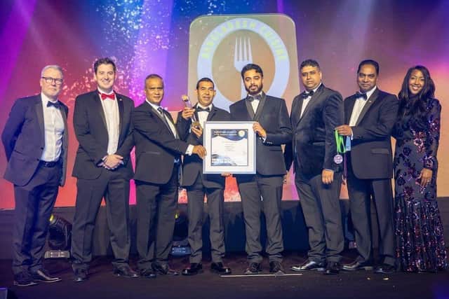 Abdul Hye receiving the Chef of the Year award