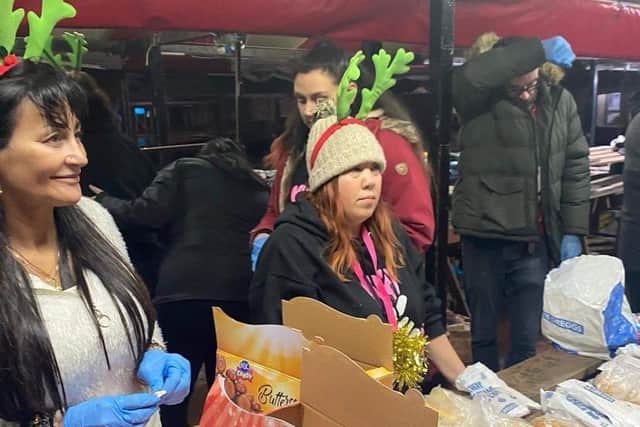 Some of the founder's friends turned up to help and serve the food, and seeing the 14 volunteers made Lisa emotional.
