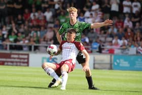 Kieron Bowie battles for possession in the Sixfields clash with Doncaster Rovers (Picture: Pete Norton)
