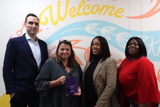 Winning project team members Paul Tucker, Tracey Thompson, Lauren Campbell, Andrea Johnson