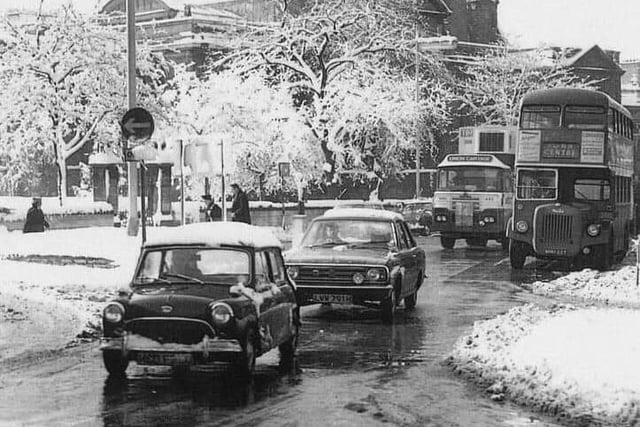 Cars driving in Mercers Row. Circa 1950s/1960s.