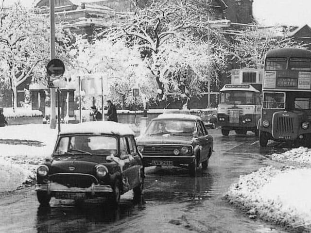 Cars driving in Mercers Row. Circa 1950s/1960s.