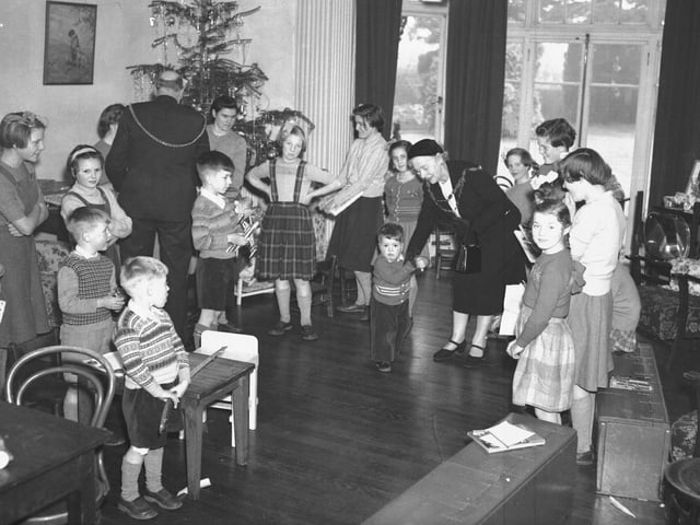 Mayor and mayoress at children's Christmas party