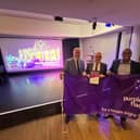 Mark Mullen and Charlie Childs collecting Noerthampton's Purple Flag accreditation