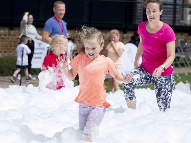 A family-friendly fun run, with water slides and obstacles, took place at Upton Country Park on Saturday (August 12) to raise funds for a Northampton charity.