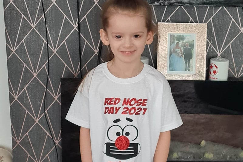 Five-year-old Phoebe kitted out in her custom t-shirt.