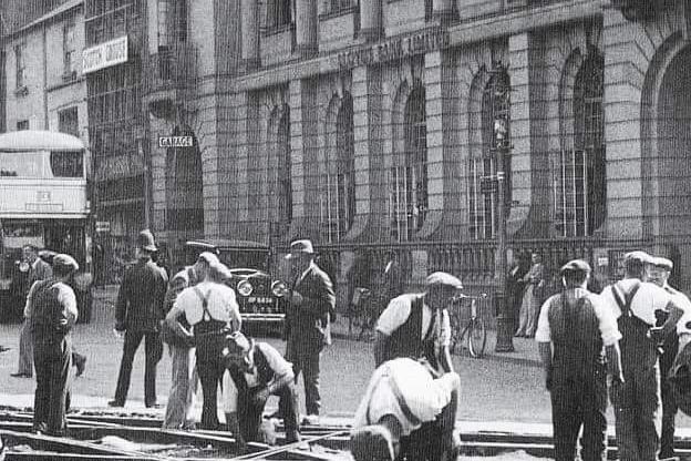 Workers fixing the tram tracks outside the Lloyds Bank building in George Row. Year unknown.